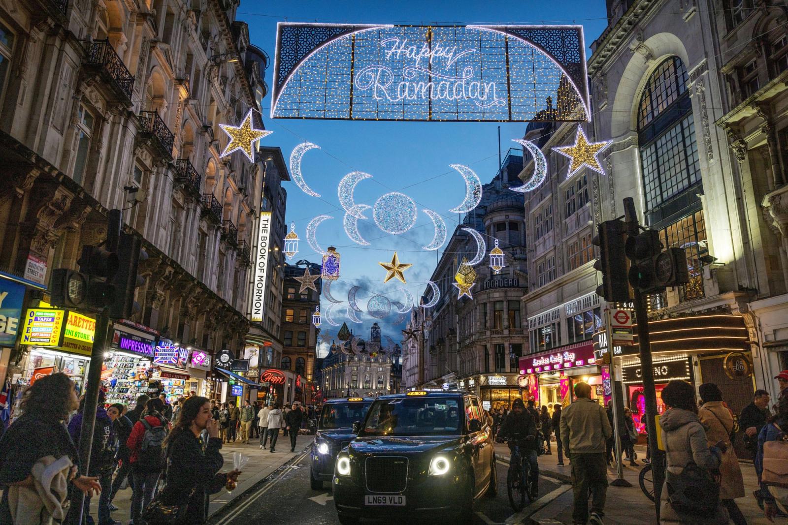 First ever Ramadan lights installation at Piccadilly Circus is pictured on the eve of the first day of Ramadan, in London, Britain, March 21 2023. Anna Gordon/REUTERS