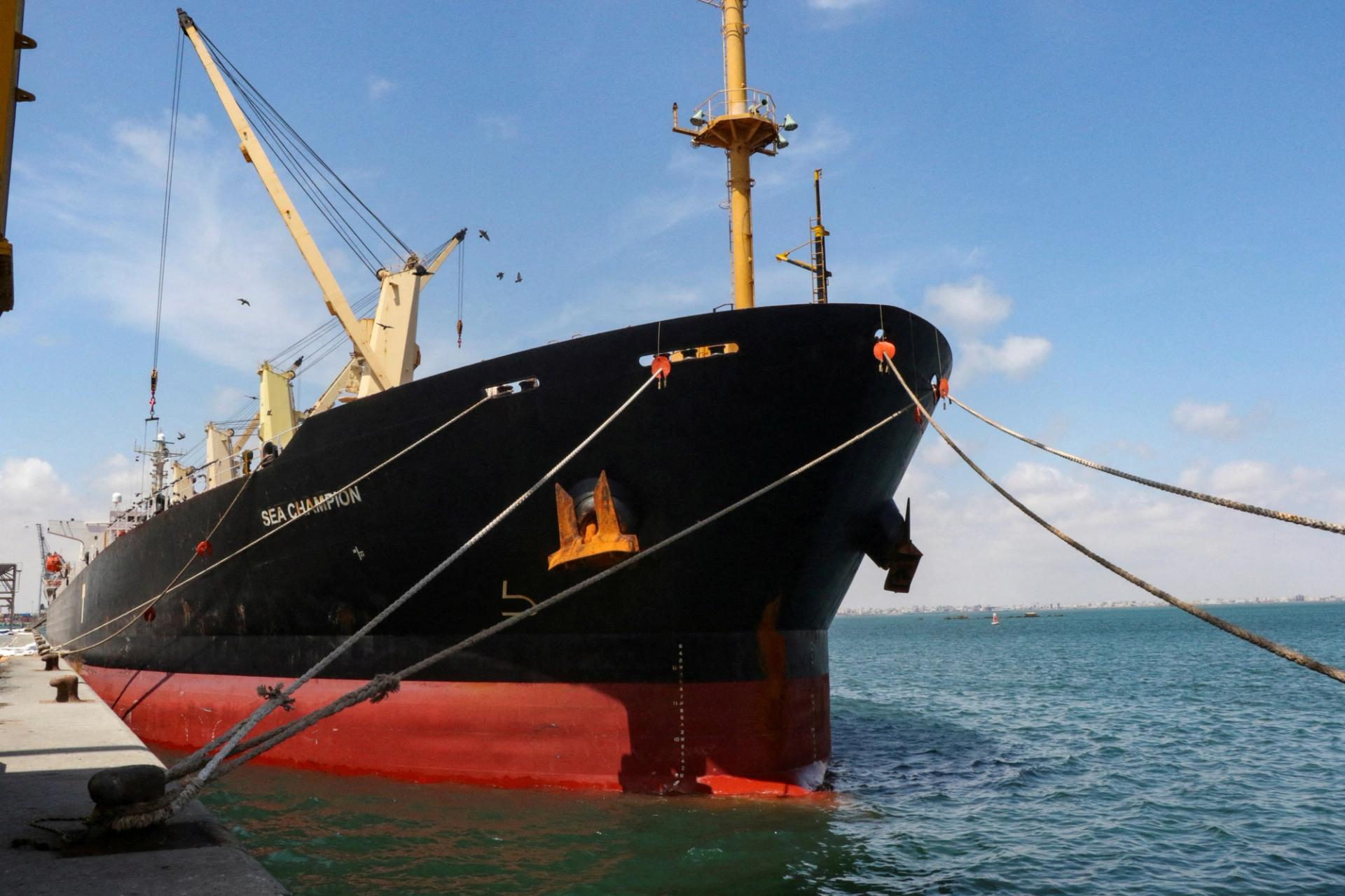 FILE PHOTO: Greek-flagged bulk cargo vessel Sea Champion is docked to the port of Aden, Yemen to which it arrived after being attacked in the Red Sea in what appears to have been a mistaken missile strike by Houthi militia, February 21, 2024. REUTERS/Fawaz Salman/File Photo