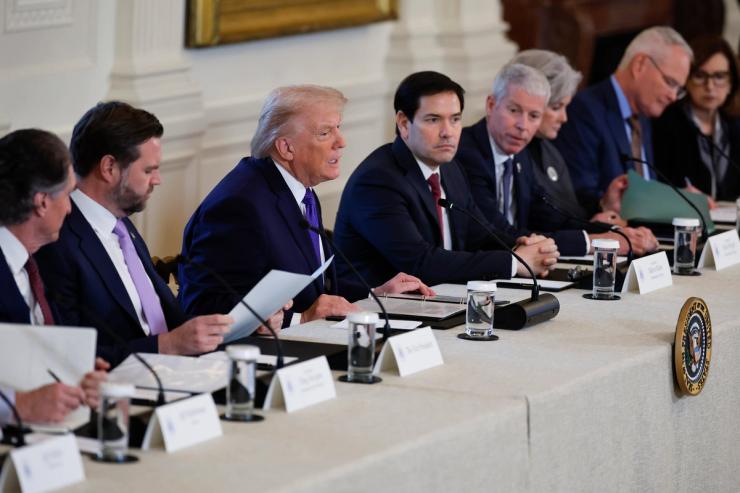 US President Donald Trump (C-L) and Secretary of State Marco Rubio.