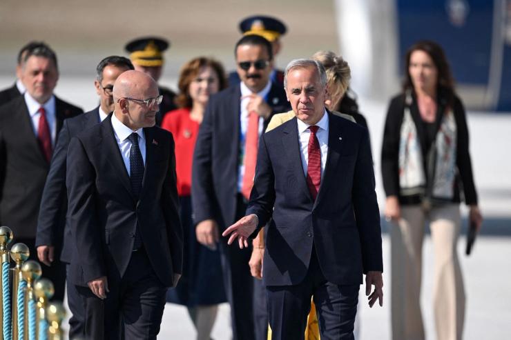 Canadian Prime Minister Mark Carney and Turkish Treasury and Finance Minister Mehmet Şimşek.