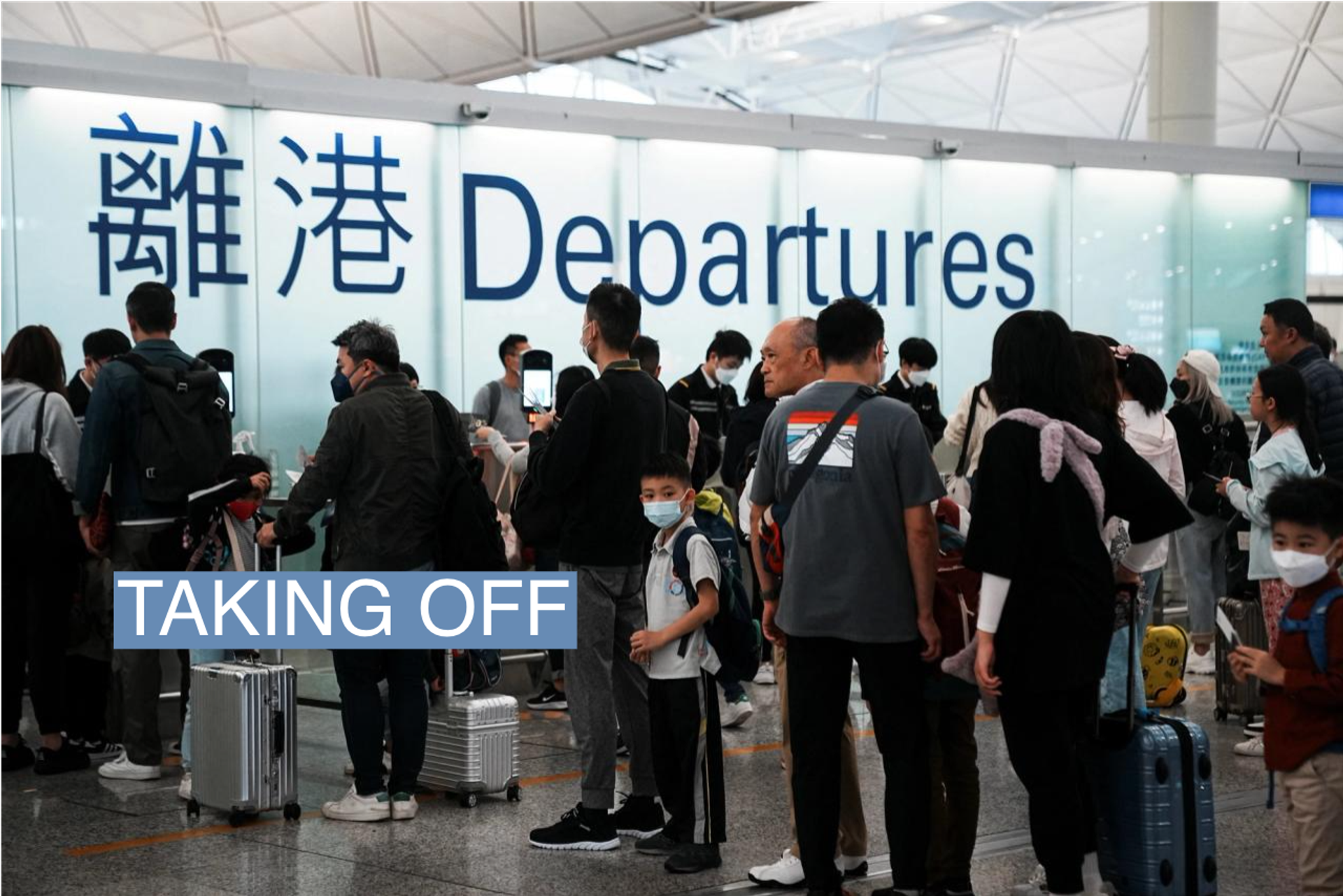 Travellers queue up at the departures hall at Hong Kong International Airport, in Hong Kong, China April 5, 2023. REUTERS/Lam Yik
