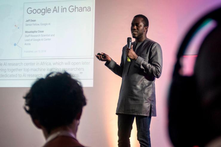 Moustapha Cisse, head of Google’s AI centre in Ghana, speaks during a presentation in Accra on 10 April 2019.