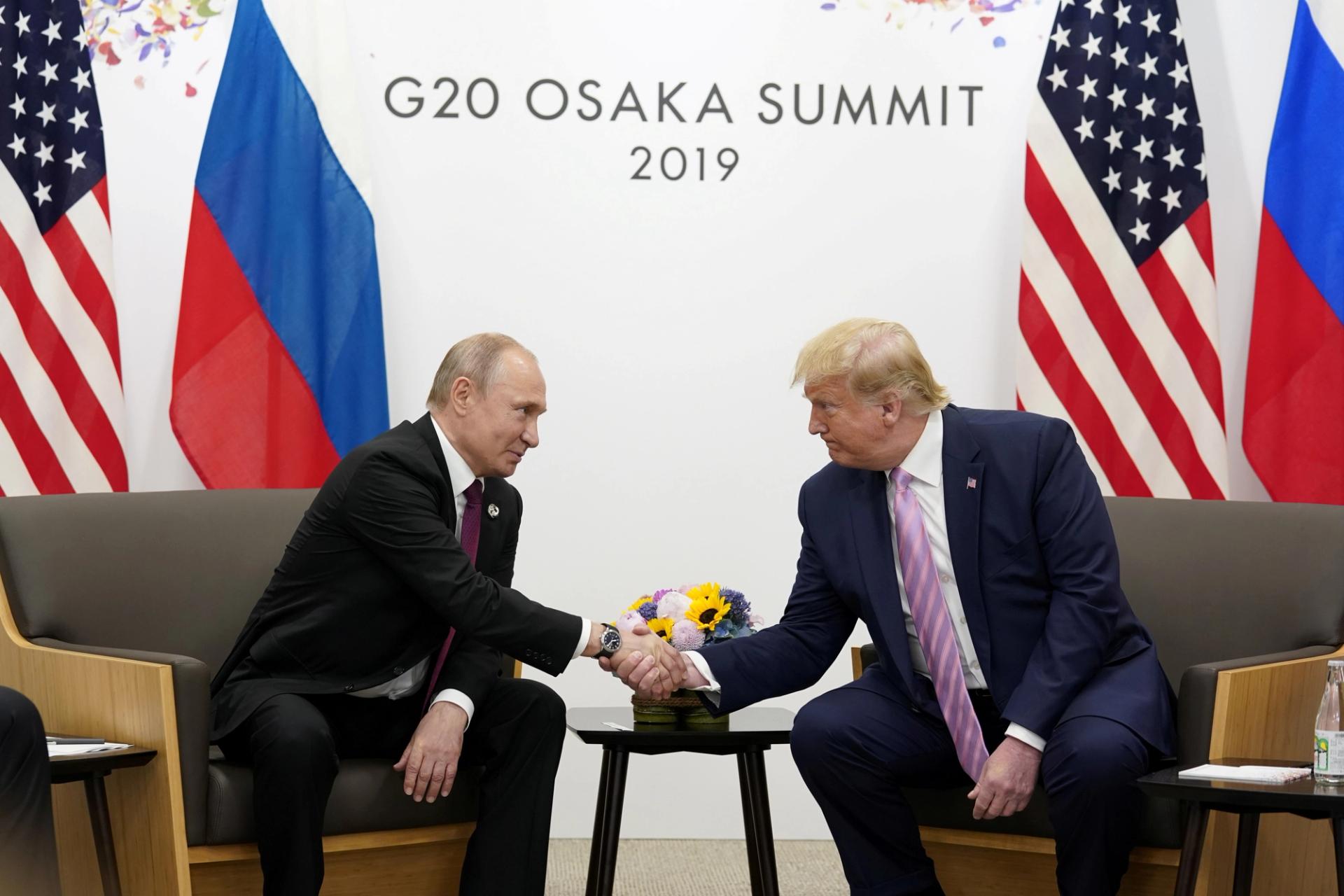 Donald Trump and Vladimir Putin at a 2019 G20 meeting.