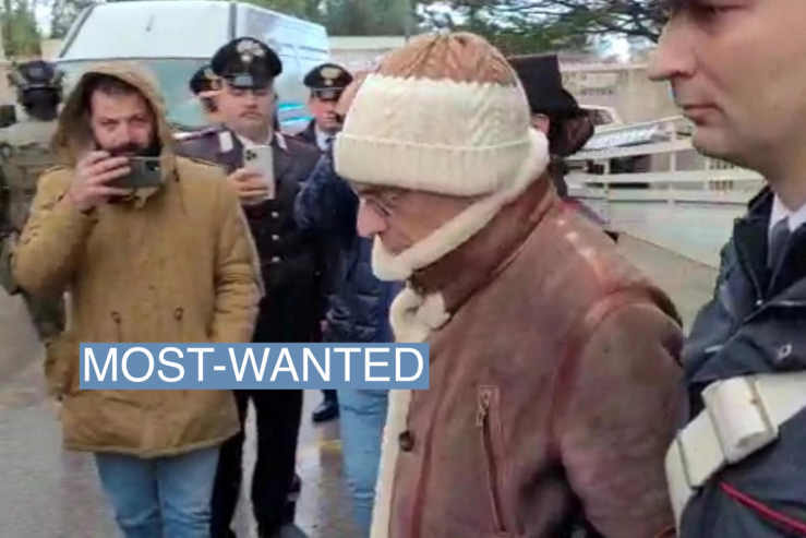 A screengrab taken from a video shows Matteo Messina Denaro the country’s most wanted mafia boss being escorted out of a Carabinieri police station after he was arrested in Palermo, Italy, January 16, 2023.