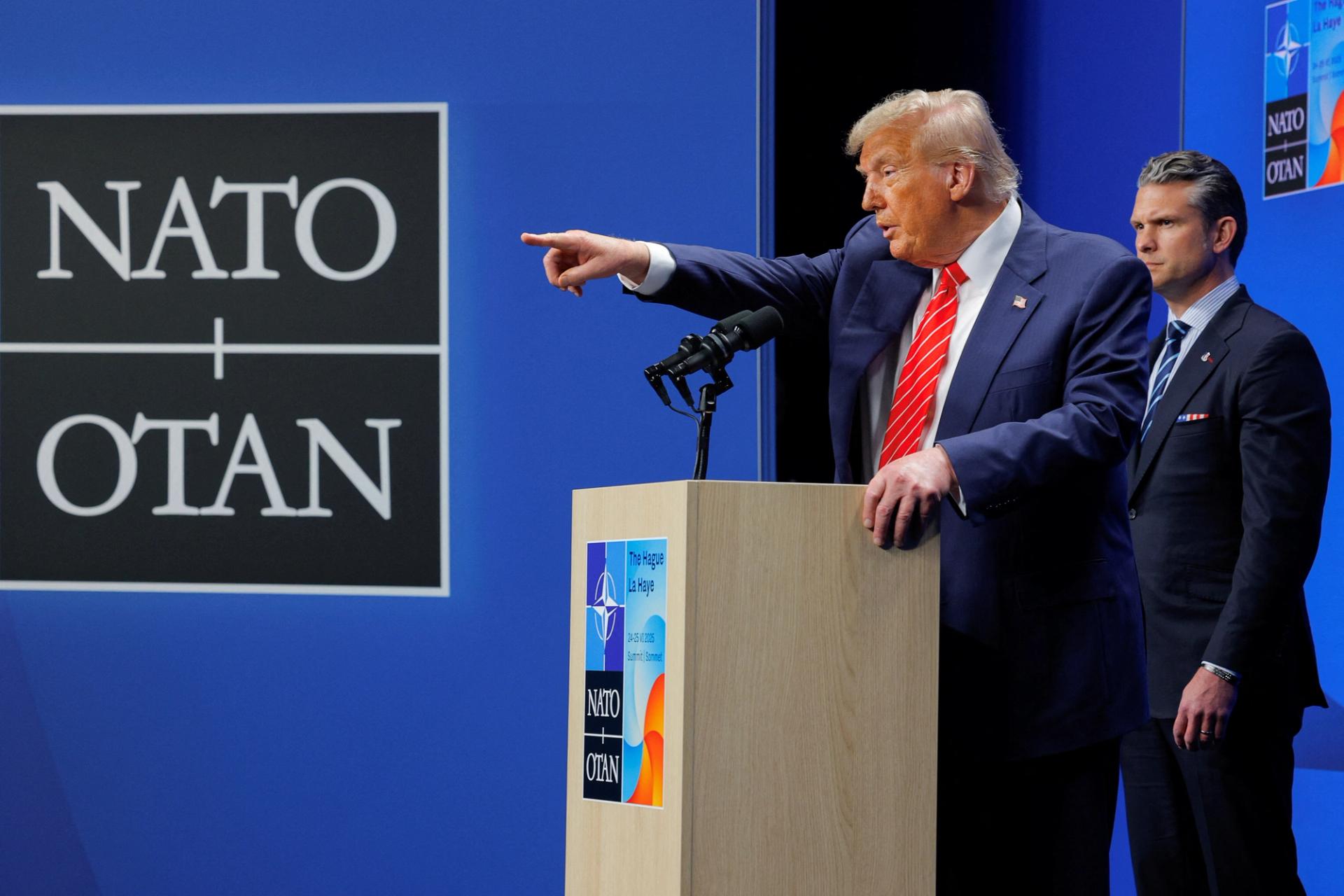U.S. President Donald Trump speaks at a press conference at NATO.