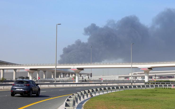 Smoke billows from Jebel Ali port after an Iranian attack.