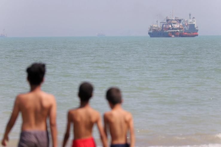 Vessels in the Strait of Hormuz near the beach of Bandar Abbas, Iran