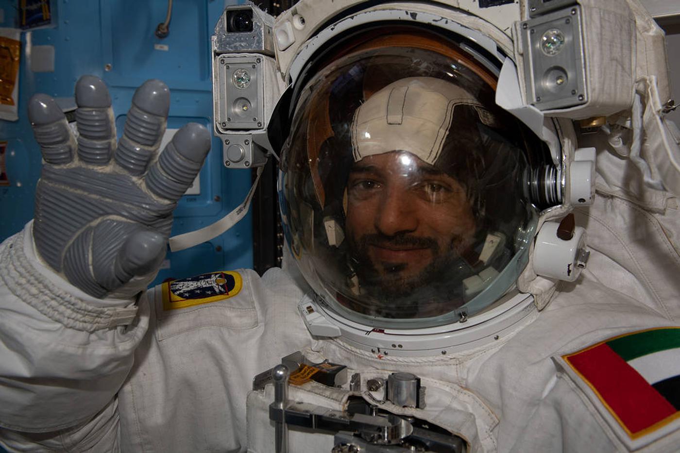 Sultan AlNeyadi tries on his spacesuit before his space walk.