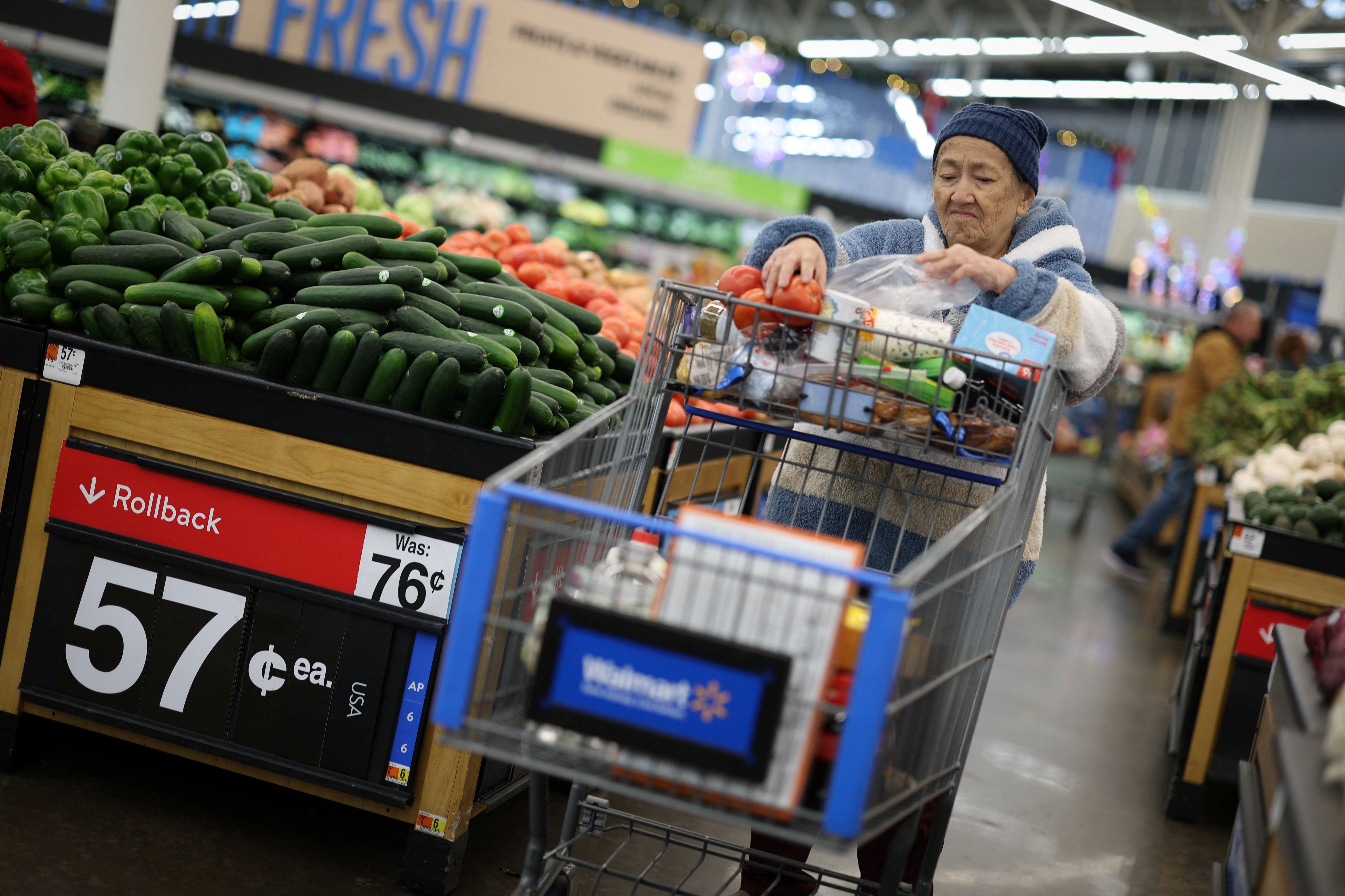 Customers shop for groceries at a Walmart Supercenter retail store in North Bergen, New Jersey
