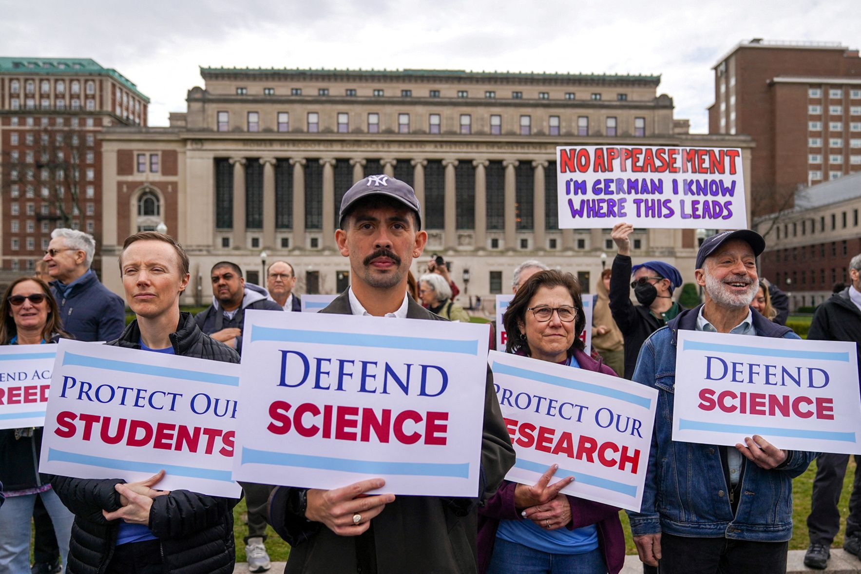 Members of the Columbia Medical physicians, nurses, researchers, and faculty protest against funding cuts