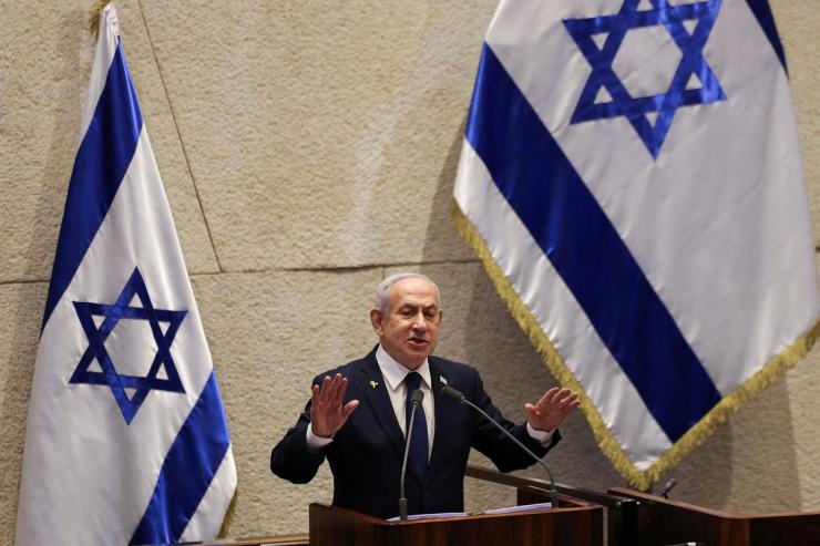 Israeli Prime Minister Netanyahu speaks at the plenum of the Knesset.