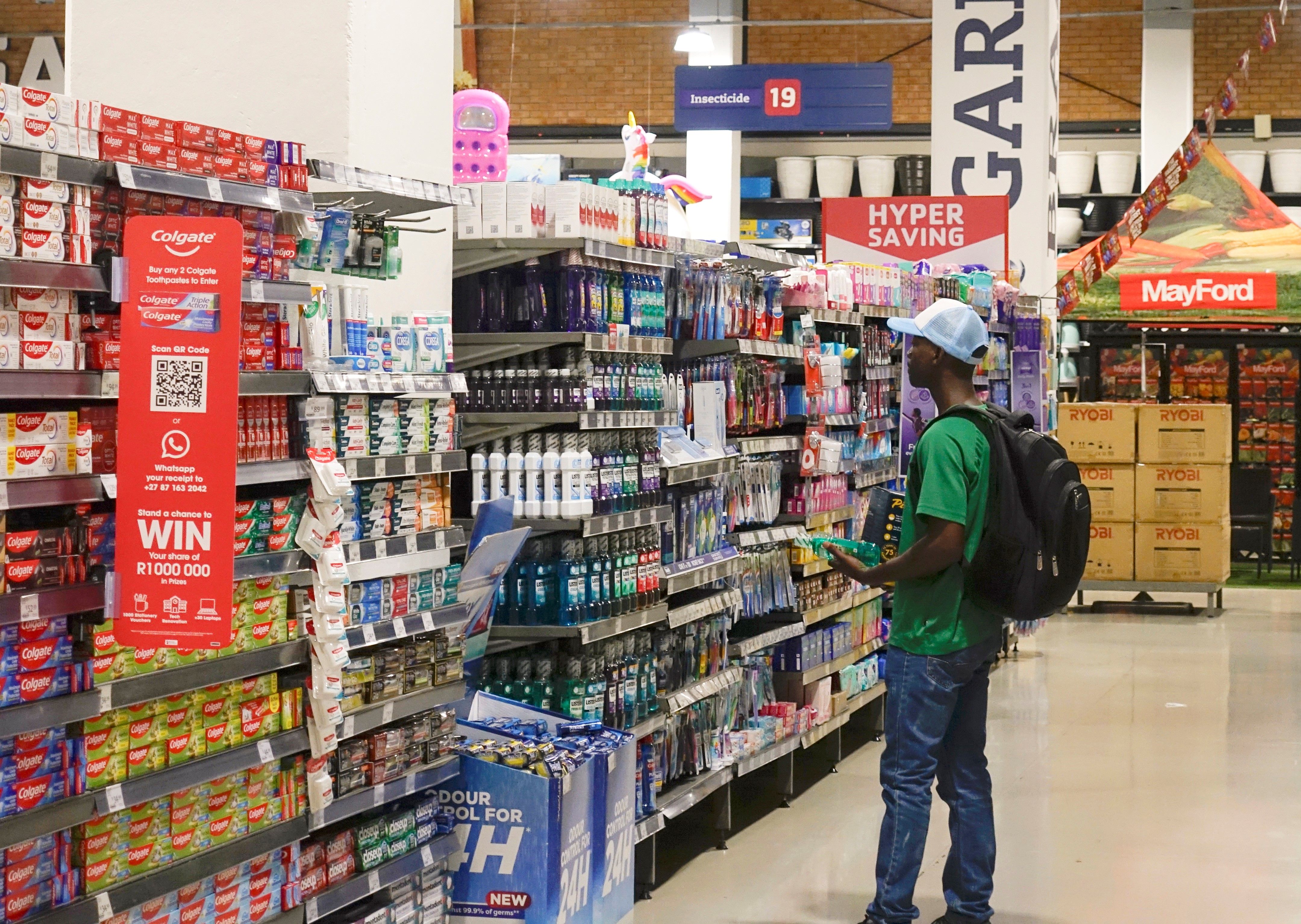A customer shops for groceries at a market in Johannesburg.