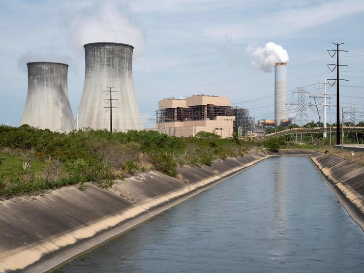 Steam rises from the cooling towers of the coal-fired power plant at Duke Energy’s Crystal River Energy Complex.
