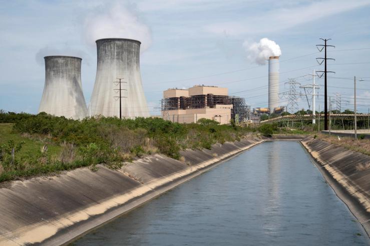 Steam rises from the cooling towers of the coal-fired power plant at Duke Energy’s Crystal River Energy Complex.