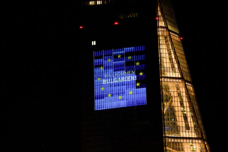 The facade of the European Central Bank (ECB) headquarters is illuminated during a rehearsal of a ceremony to celebrate Bulgaria’s accession to the Eurozone.