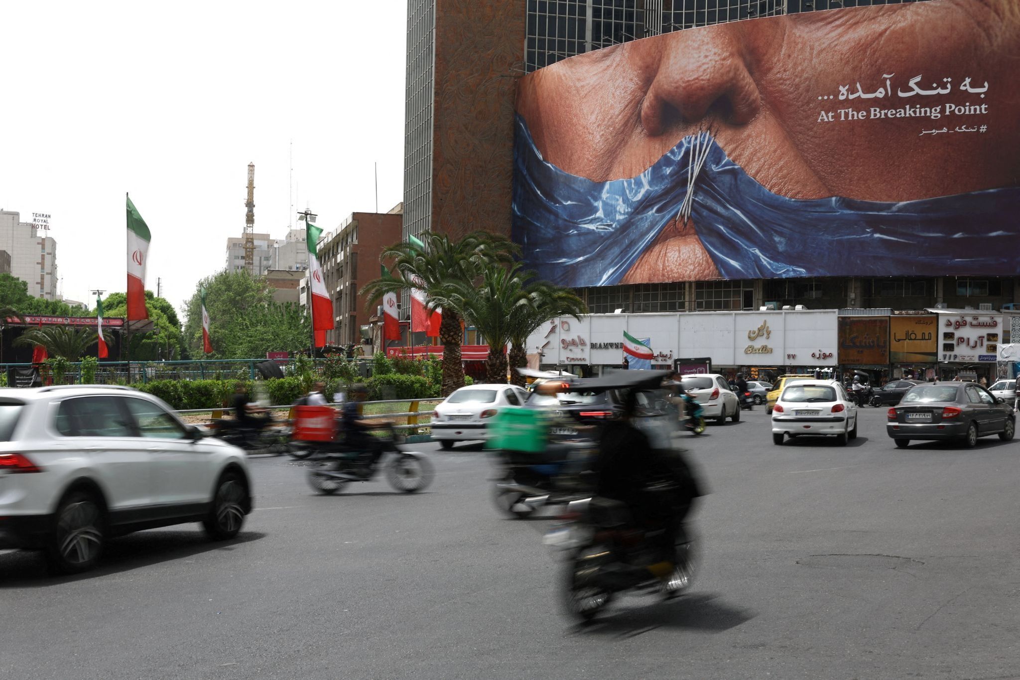 A photo showing a billboard in Tehran depicting Trump and the Strait of Hormuz.
