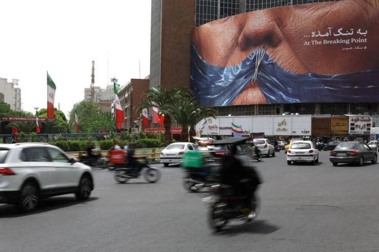 A photo showing a billboard in Tehran depicting Trump and the Strait of Hormuz.