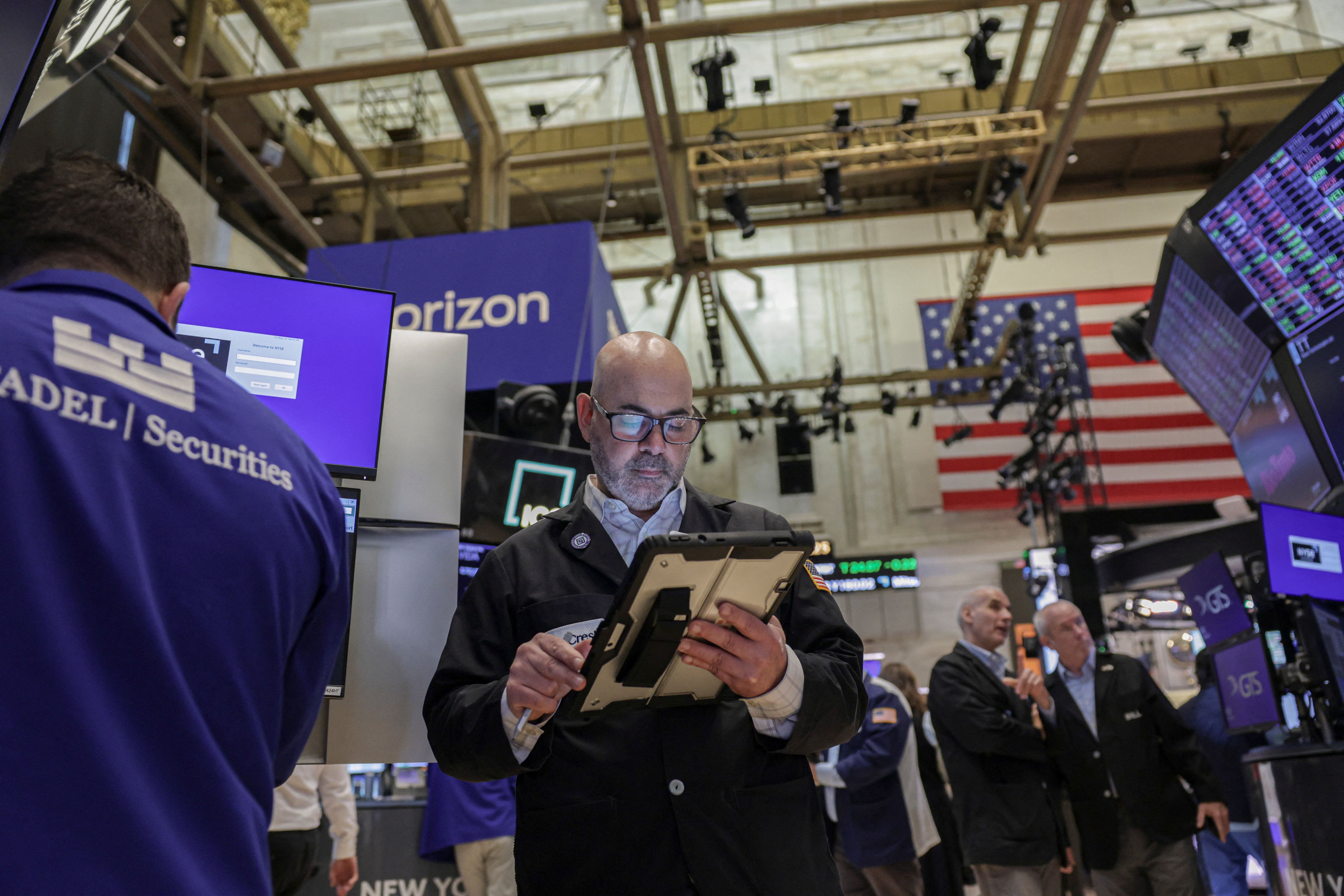 A trader on the floor of the New York Stock Exchange