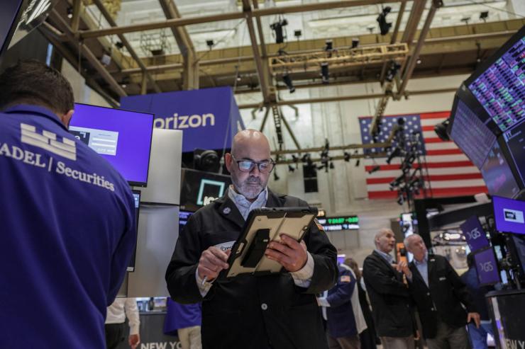 A trader on the floor of the New York Stock Exchange