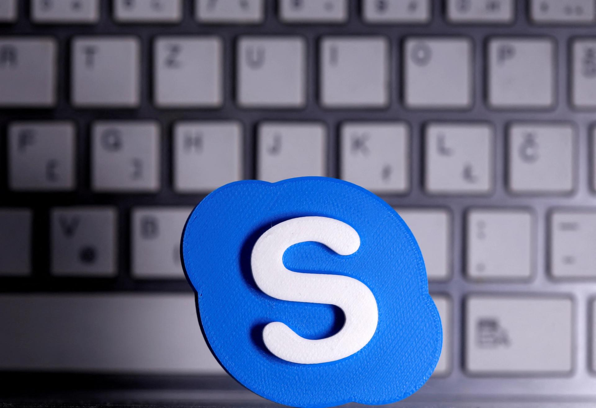 Skype logo over a keyboard