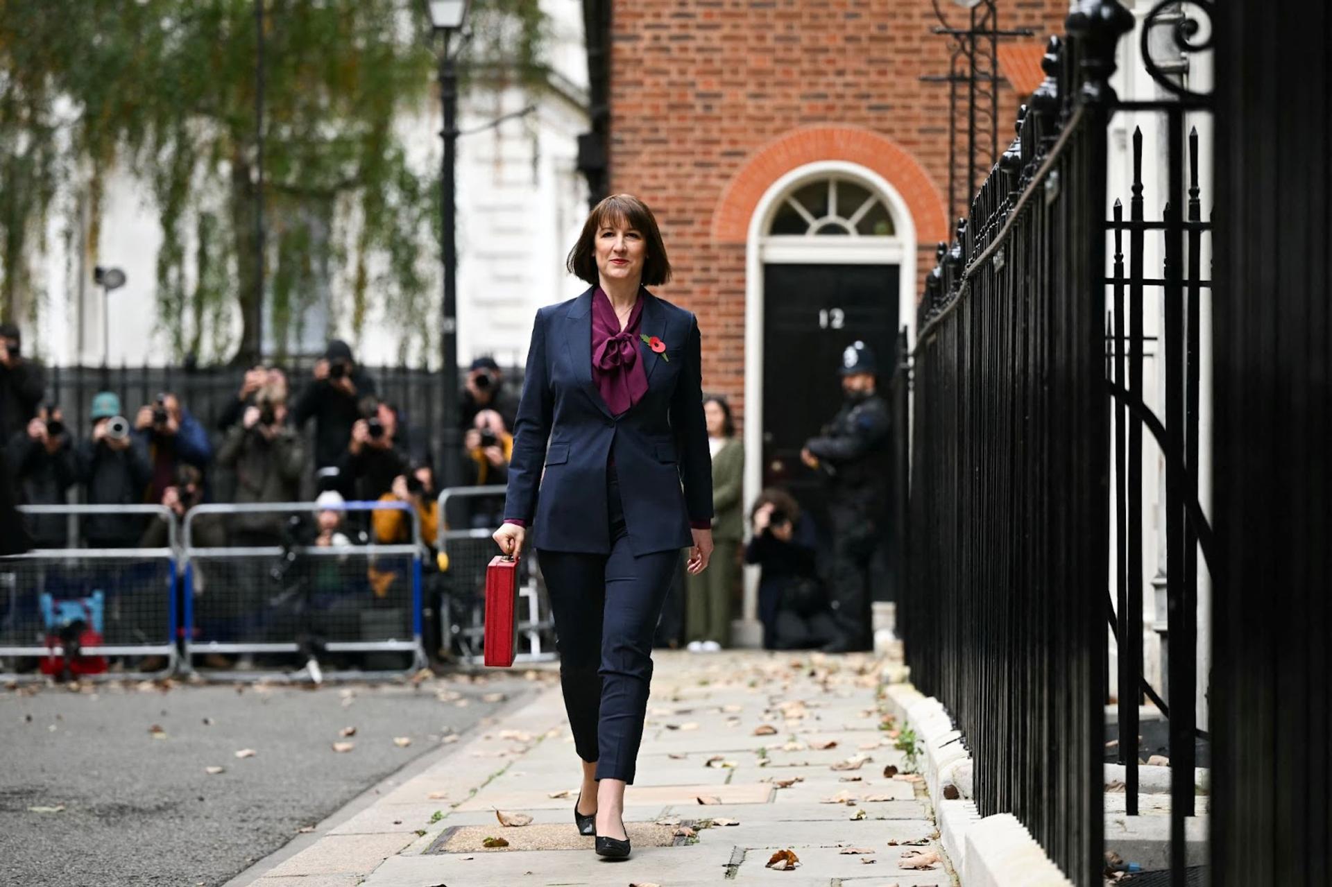 Chancellor Rachel Reeves pictured carrying a red box at Downing Street ahead of the Autumn Budget 