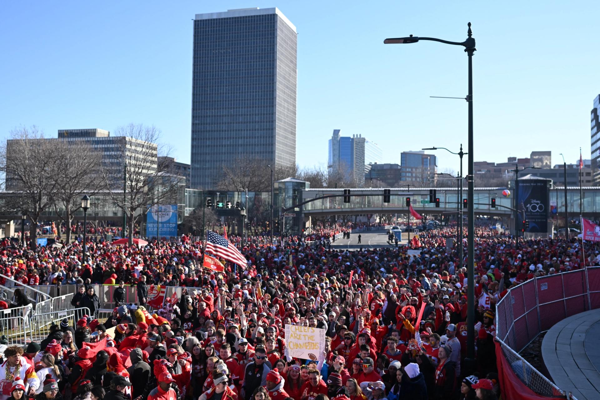 Kansas City Chiefs fans cheer as they get ready for the Chiefs' Super Bowl LVIII victory parade on Feb. 14, 2024, in Kansas City, Missouri.