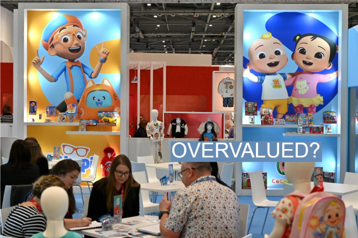Posters showing Blippi and Cocomelon characters are displayed at an event in London.