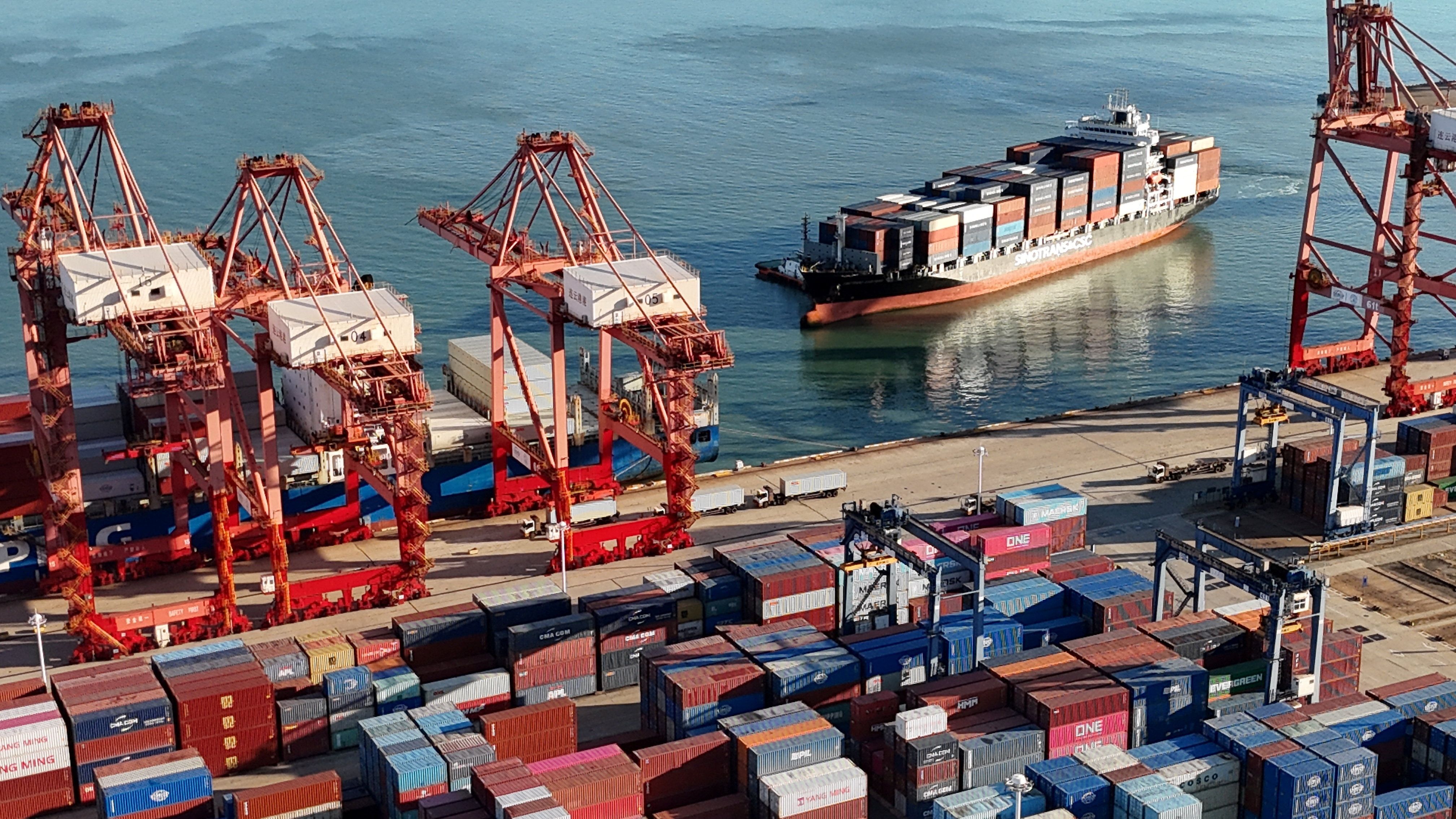 A drone view shows a cargo ship approaching a container terminal at Lianyungang port, China Oct. 14, 2026