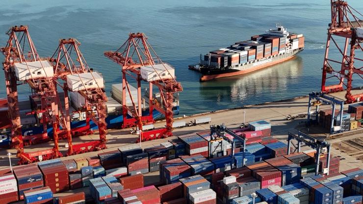 A drone view shows a cargo ship approaching a container terminal at Lianyungang port, China Oct. 14, 2026