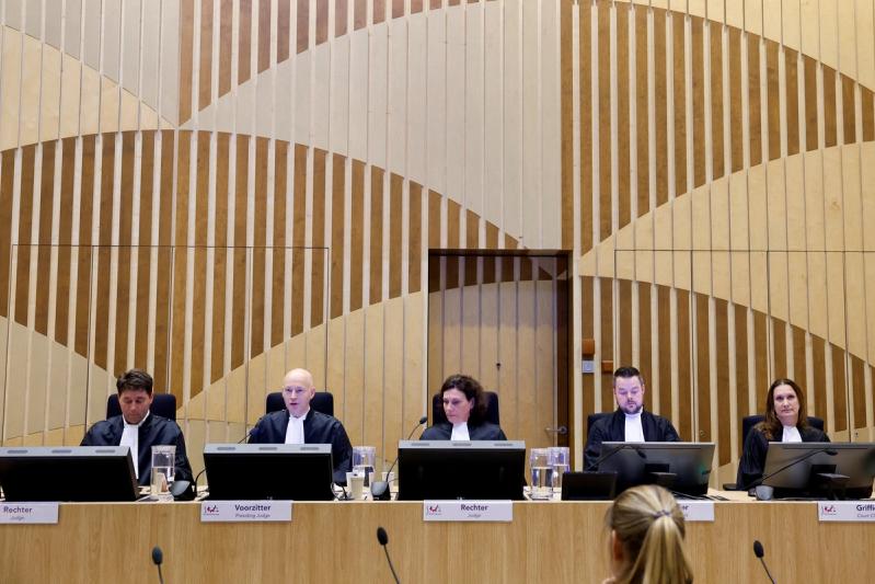 Judges sit in the courtroom as the Dutch court announces its ruling in the MH17 trial of three Russians and a Ukrainian in the Schiphol Judicial Complex.