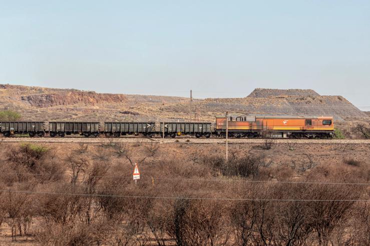 A general view a Transnet freight rail transport train near the Anglo American Sishen Iron Ore mine near Kathu on November 22, 2023.