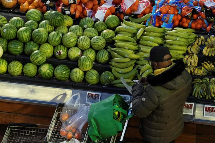 A person browses a grocery store.
