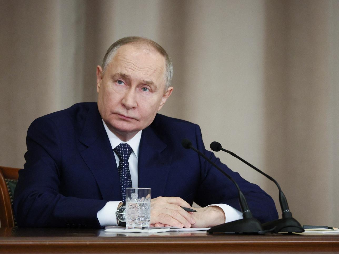 Russian President Vladimir Putin attends a meeting with judges of the domestic courts in Moscow, Russia, February 20, 2025.