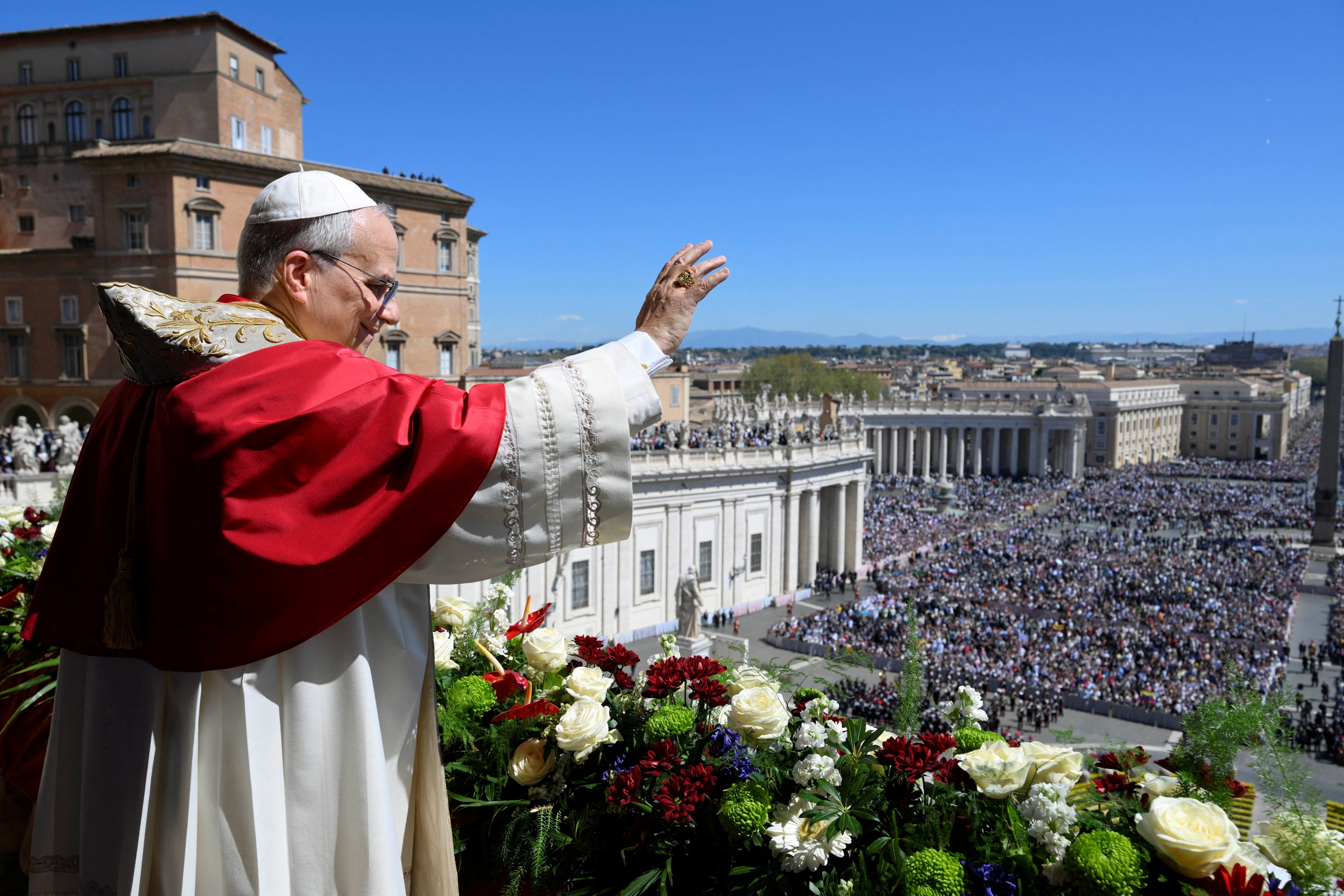 Pope Leo XIV delivers his Easter speech from the main balcony of St. Peter’s Basilica