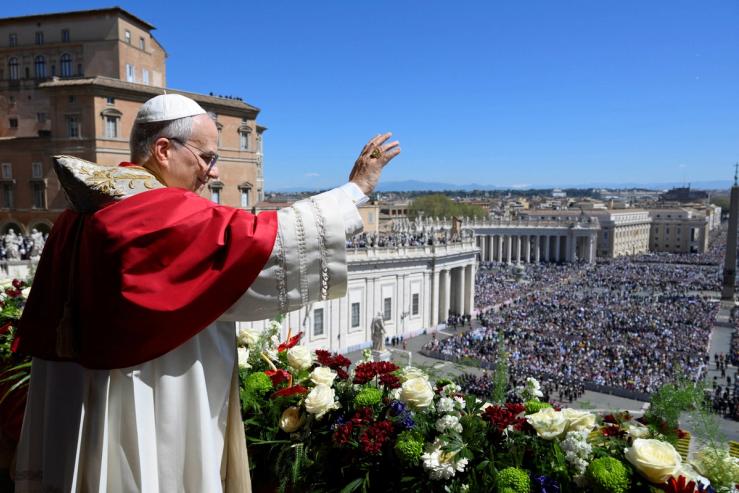 Pope Leo XIV delivers his Easter speech from the main balcony of St. Peter’s Basilica