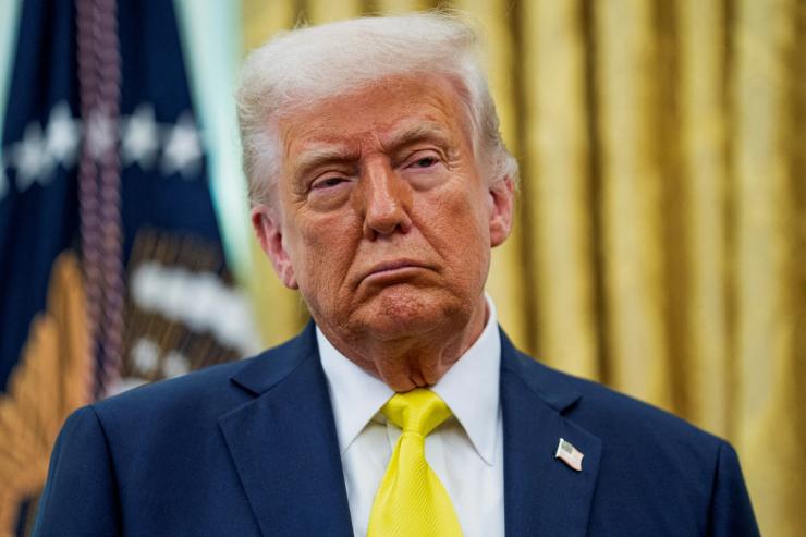 U.S. President Donald Trump listens to remarks on April 18th in the Oval Office.