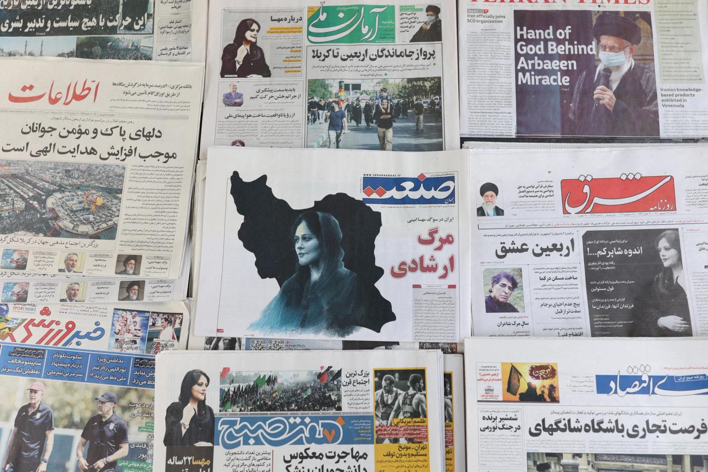 Newspapers, with a cover picture of Mahsa Amini, are seen in Tehran, Iran September 18, 2022. 
