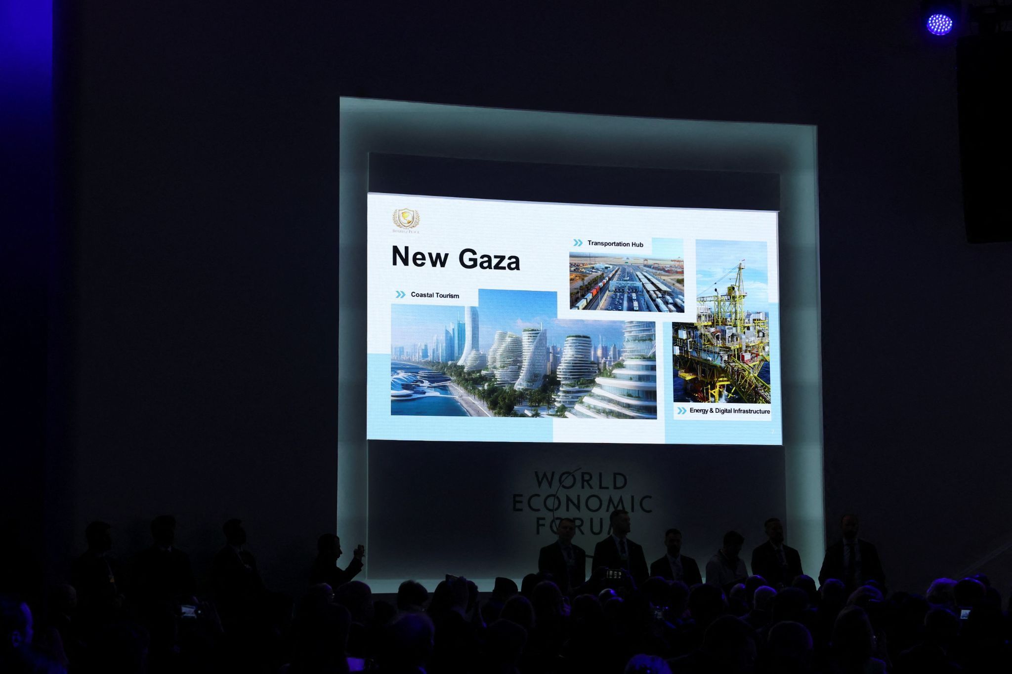 A slide titled “New Gaza” is seen on a screen during an event announcing the charter for U.S. President Donald Trump’s Board of Peace initiative, aimed at resolving global conflicts, alongside the 56th annual World Economic Forum 