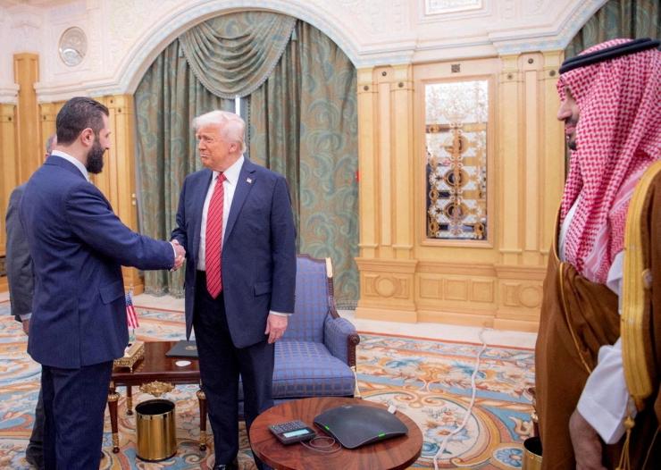 President Donald Trump meets with Syrian President Ahmed al-Sharaa in Riyadh, Saudi Arabia, in this handout released on May 14.