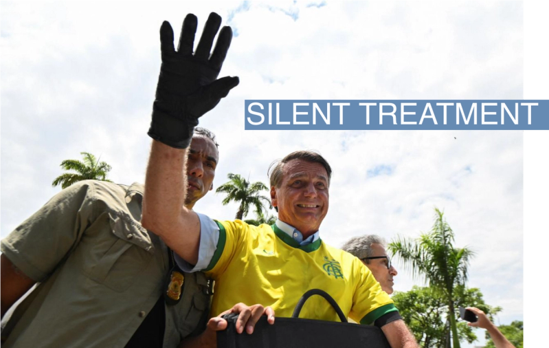 Brazil’s President and candidate for re-election Jair Bolsonaro gestures during a motorcade in Belo Horizonte, Brazil