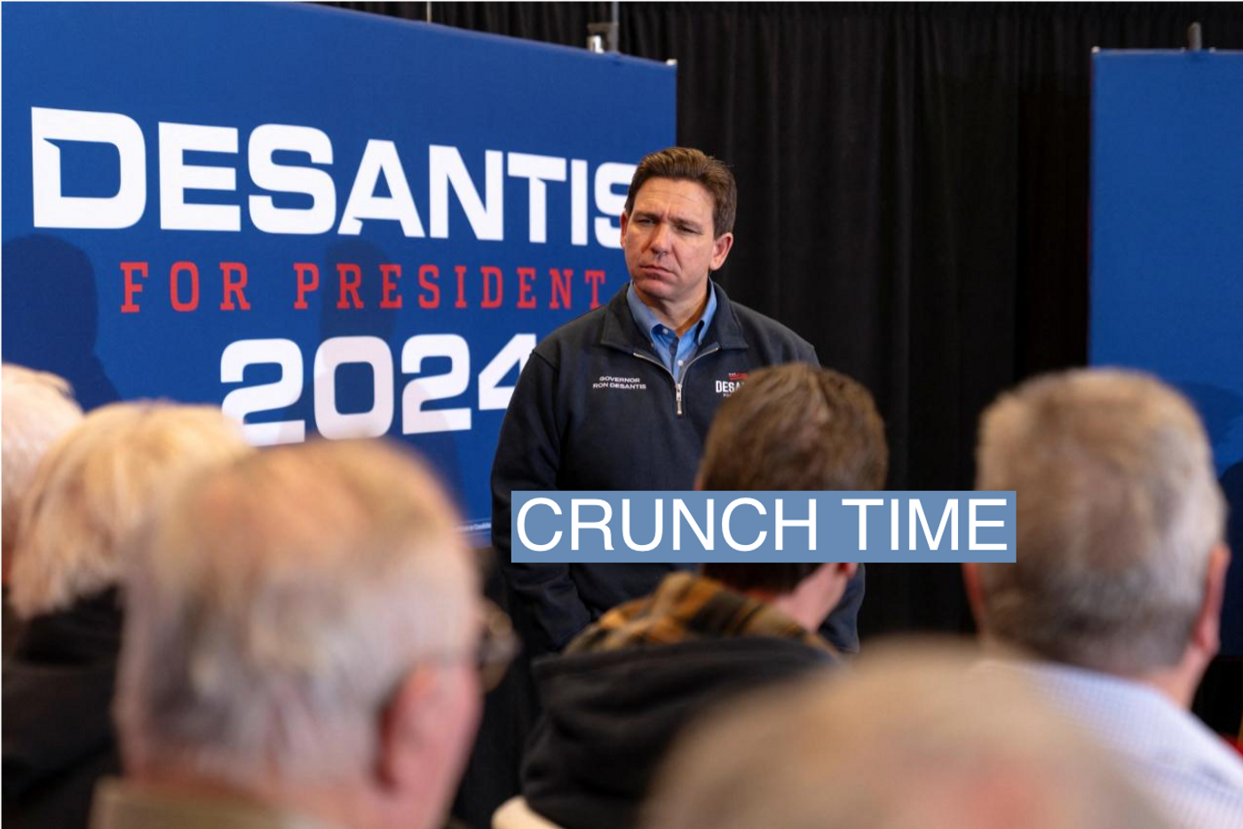 Republican presidential candidate Florida Governor Ron DeSantis listens to a question from an audience member during a campaign event in Waukee, Iowa, U.S., January 3, 2024.