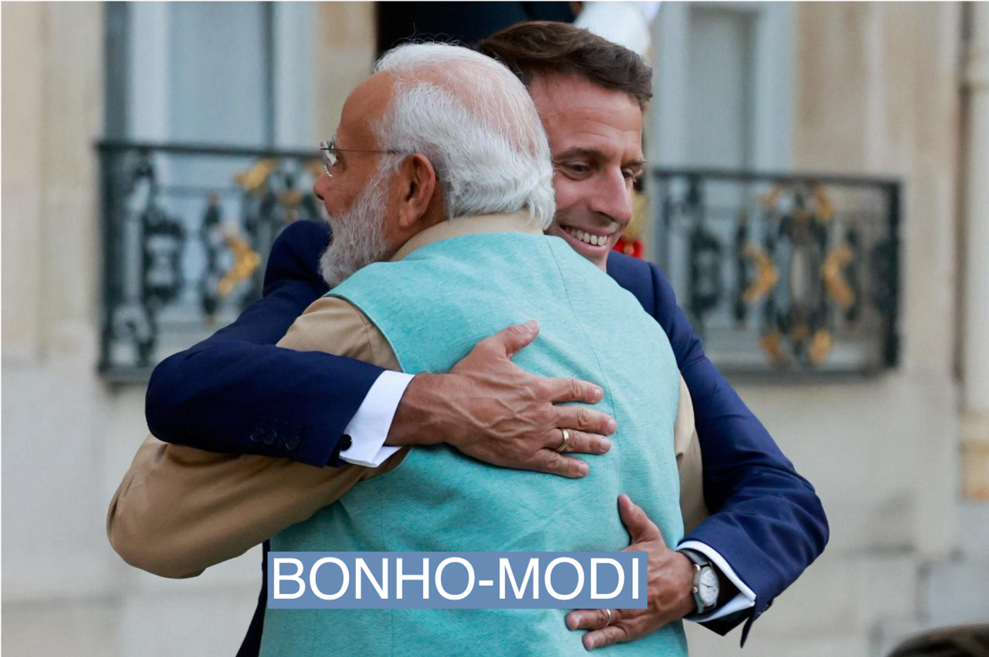 French President Emmanuel Macron embraces Indian Prime Minister Narendra Modi as he welcomes him at the Elysee Palace, in Paris, France, July 13, 2023. REUTERS/Pascal Rossignol
