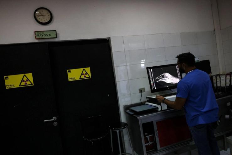 A doctor reviewing an X-ray.