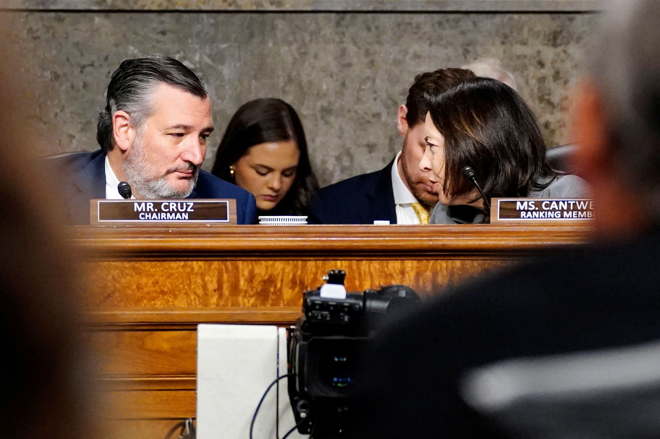 Sen. Maria Cantwell speaks to Sen. Ted Cruz during a Senate Commerce Committee hearing.