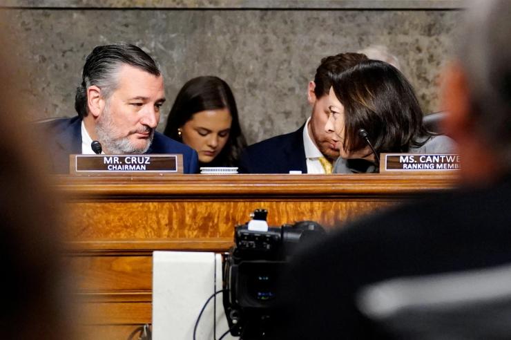 Sen. Maria Cantwell speaks to Sen. Ted Cruz during a Senate Commerce Committee hearing.