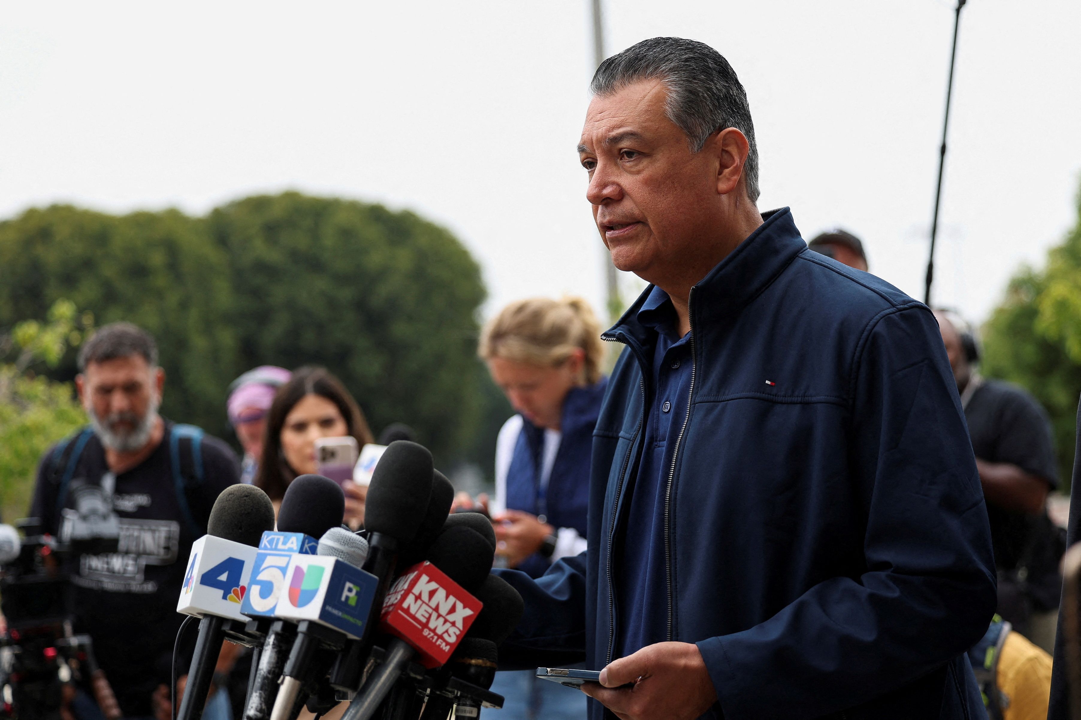 US Senator Alex Padilla (D-CA) gives a statement after being detained and removed from the venue where he interrupted the press conference held by US Secretary of Homeland Security Kristi Noem.