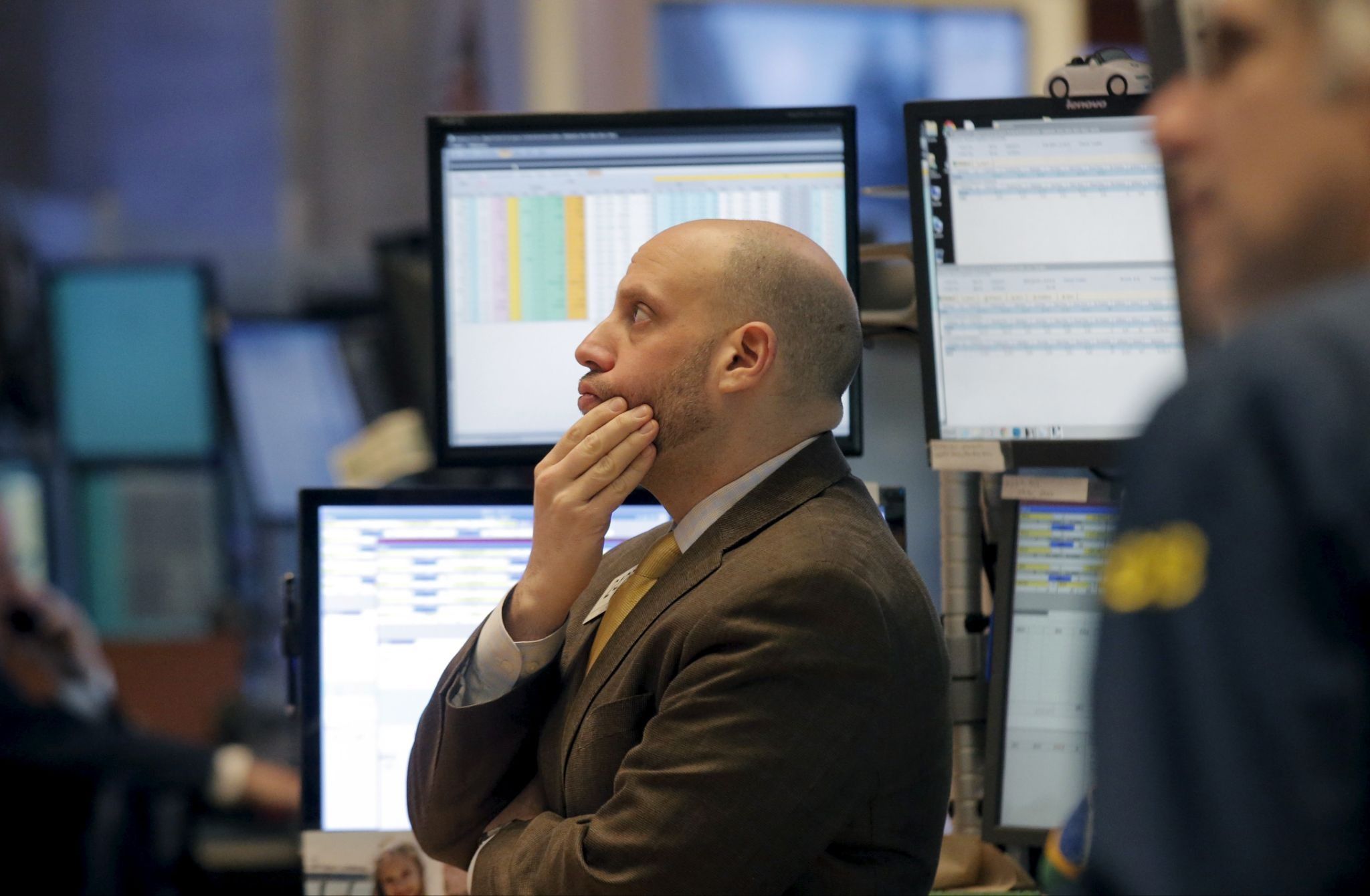 Traders react to digital stock displays