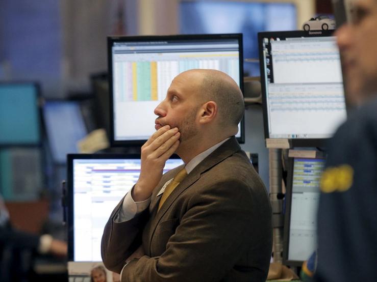 Traders react to digital stock displays
