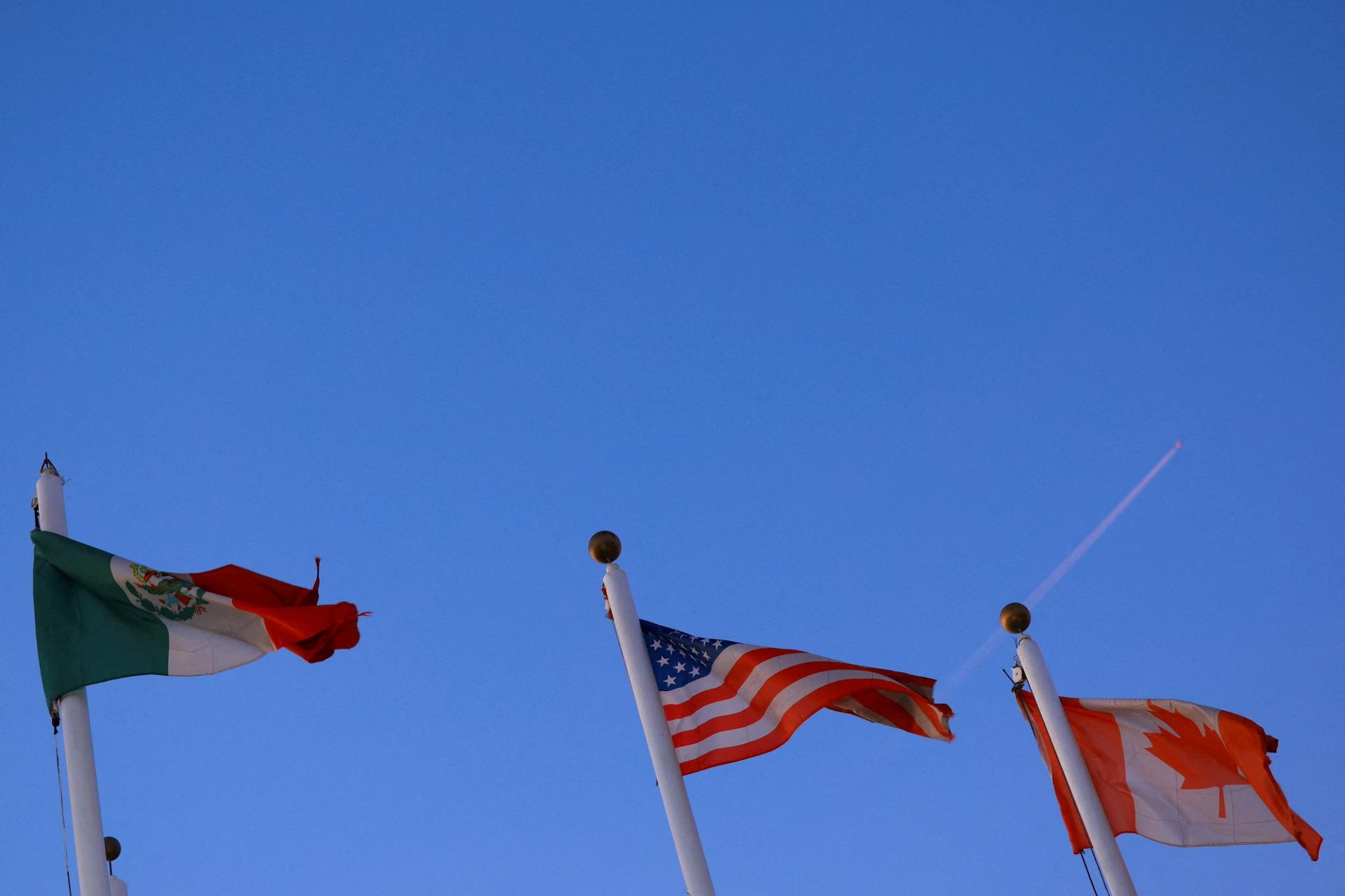 The flags of Mexico, the US, and Canada. 
