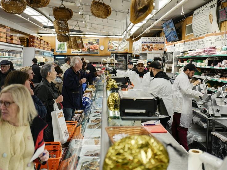 People shop at Zabar’s supermarket in New York City.
